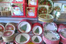 Christmas plates, napkins, and other table settings.