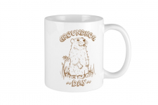 ceramic mug with groundhog day logo