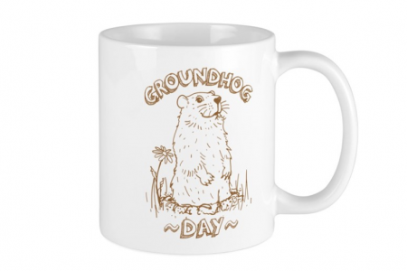 coffee mug with groundhog day logo on front